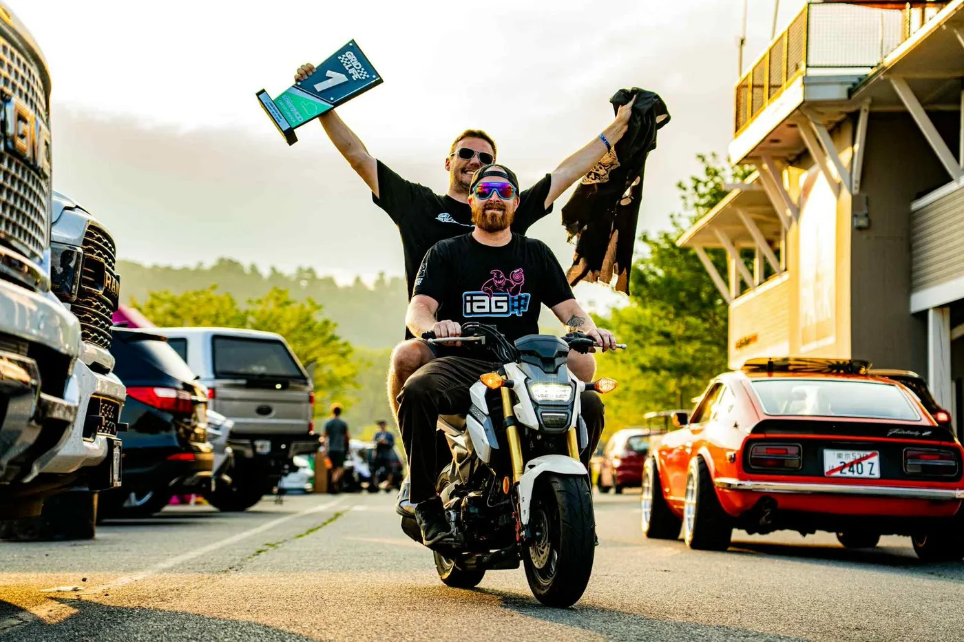 Dewey and Dylan celebrating the championship trophy