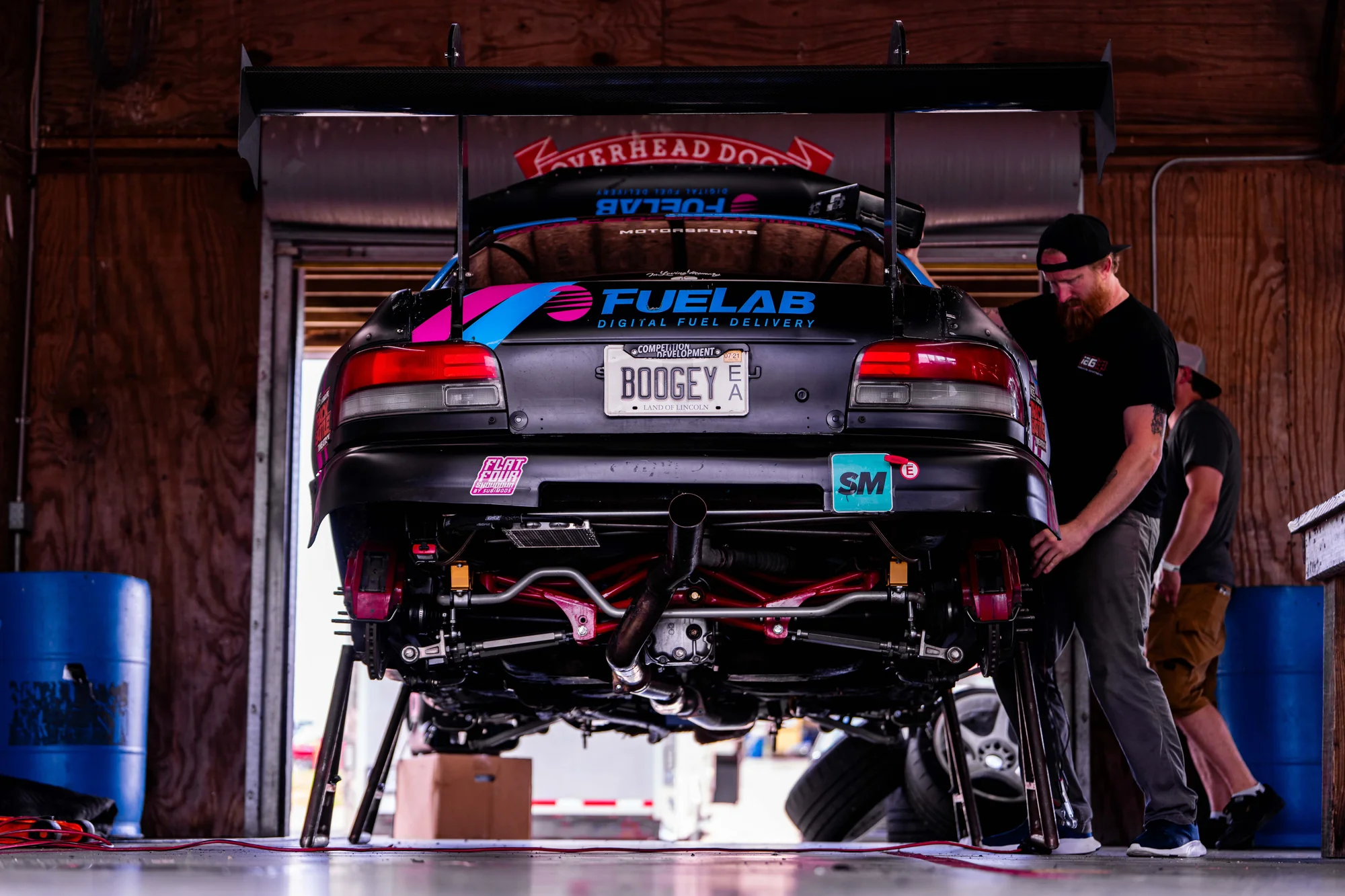 Dylan working on the car